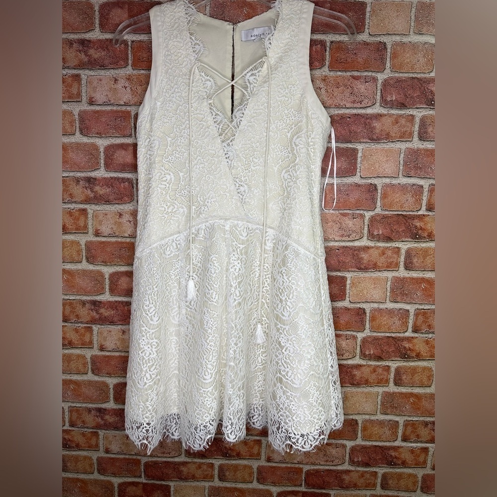 Lacy a line shift flapper Lace up front eyelash hem Suzanne dress by Adelyn Rae